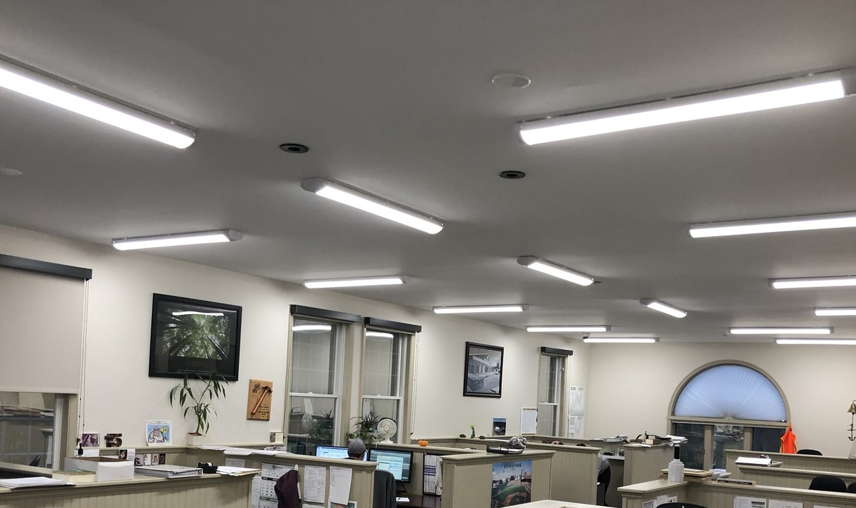 Office at Boise Cascade lit by surface-mounted linear LED fixtures, Greenland, NH
