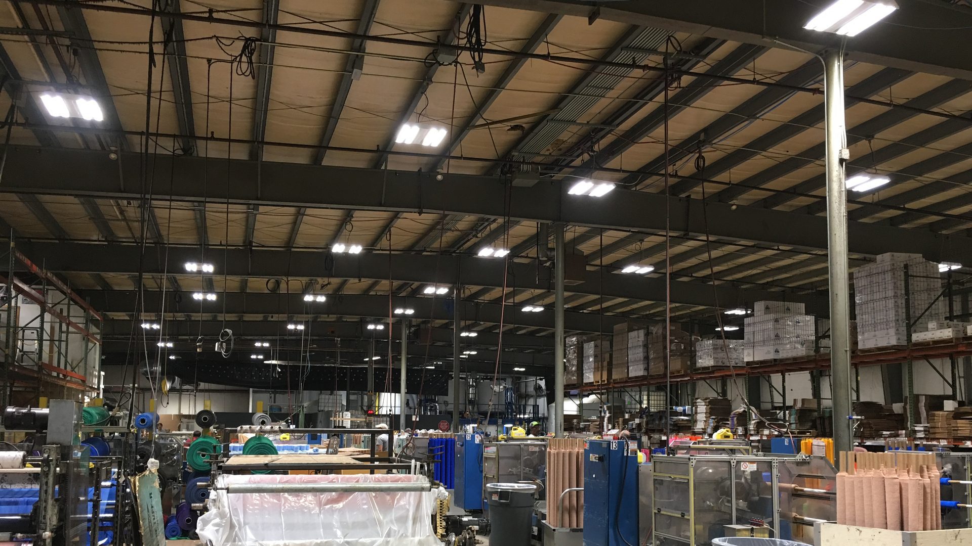Milliken Healthcare manufacturing floor under rows of LED high-bay fixtures, Salisbury, MA
