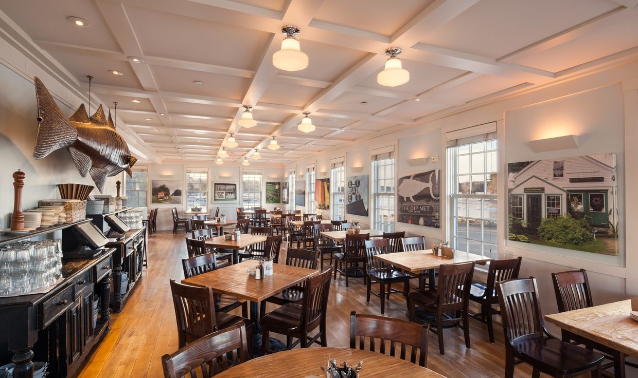 Dining room at Robert's Maine Grill with a coffered ceiling and pendant lights, Kittery, ME