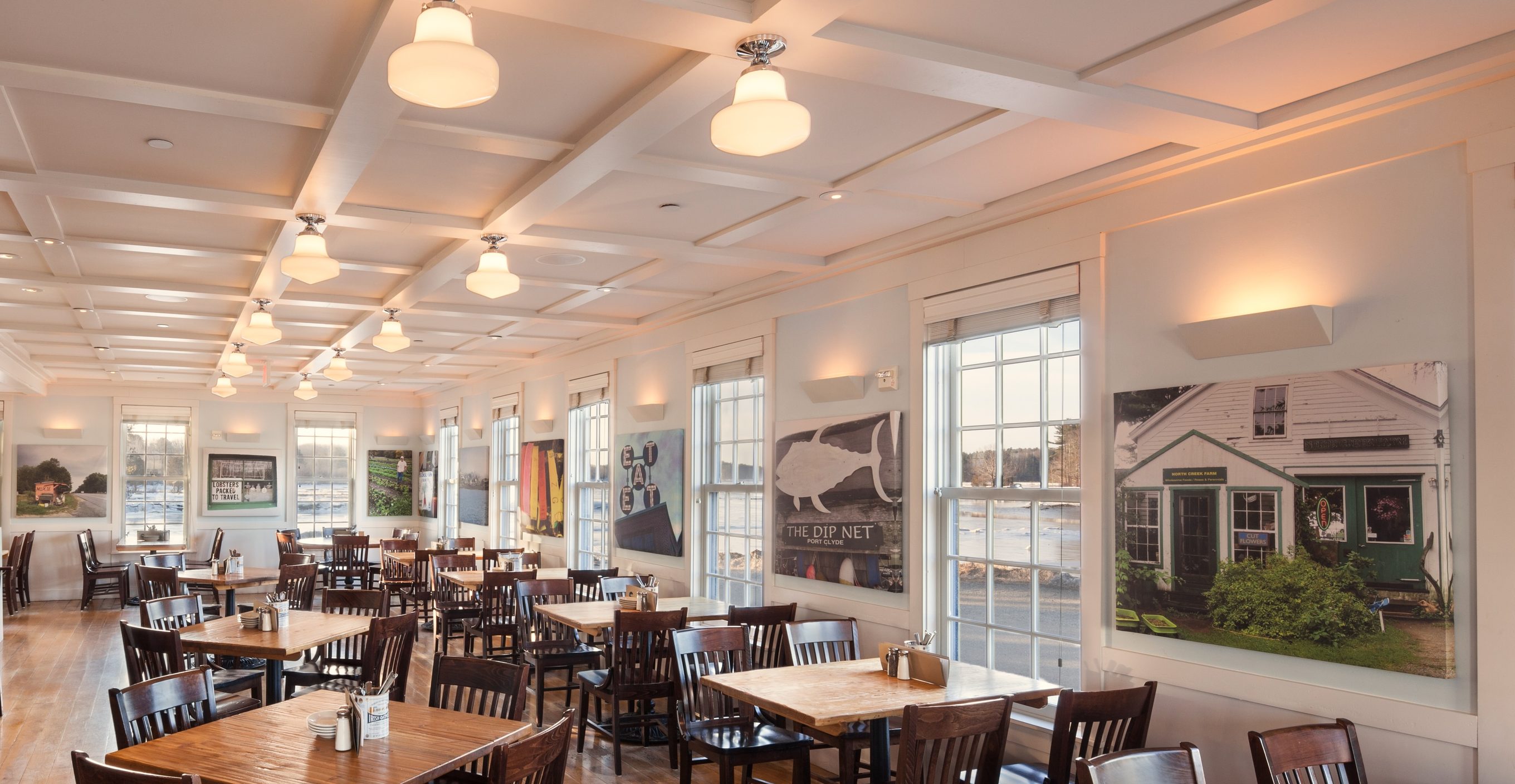 Dining room at Robert's Maine Grill with a coffered ceiling and pendant lights, Kittery, ME