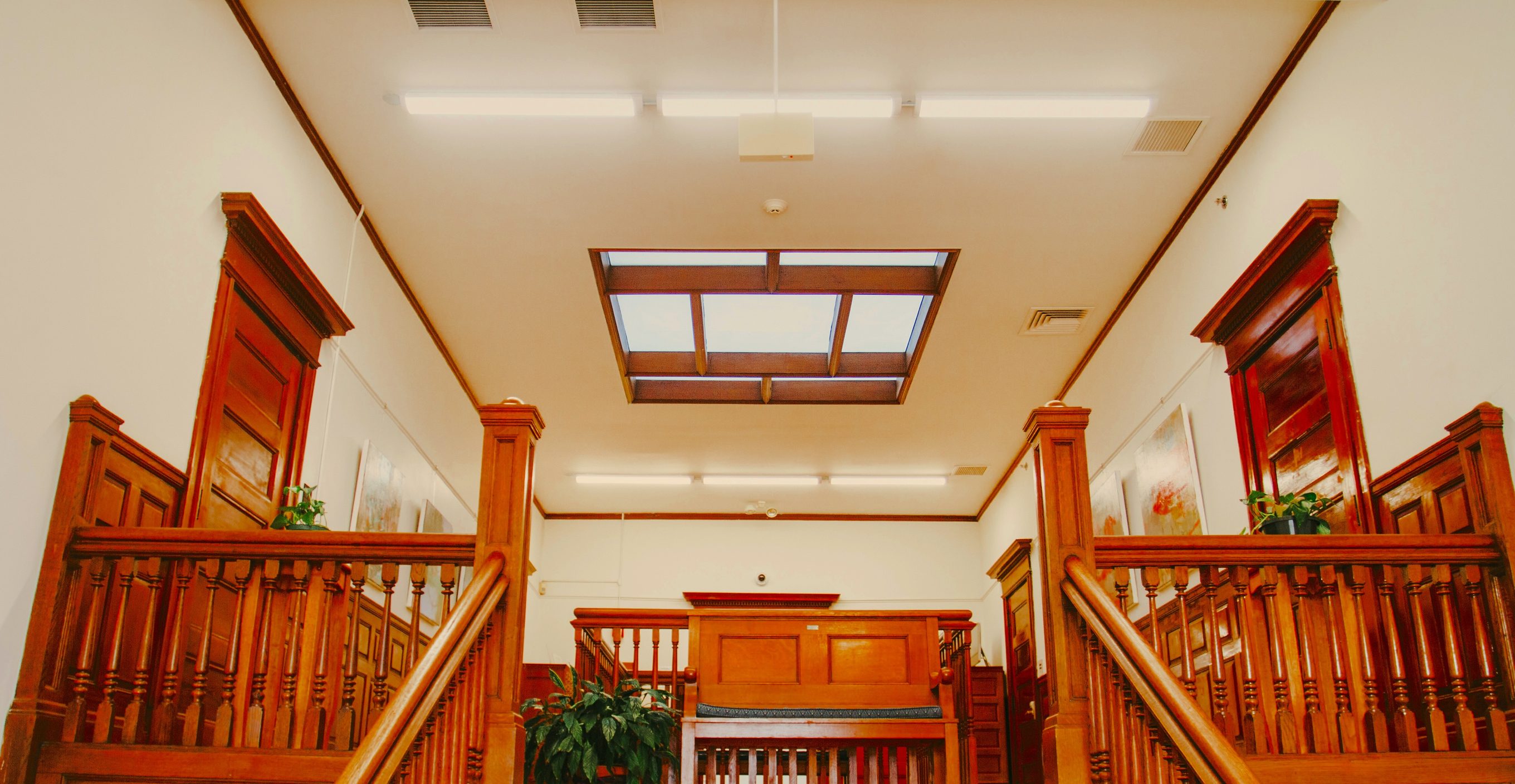 Oak staircase and skylit landing at the Rochester Public Library, Rochester, NH