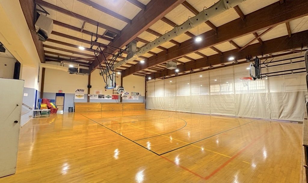Seabrook Community Center gymnasium under LED high-bay fixtures, Seabrook, NH